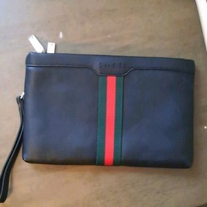 Gucci clutch with missing letters..see photos